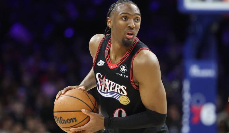 Philadelphia 76ers guard Tyrese Maxey (0) controls the ball.