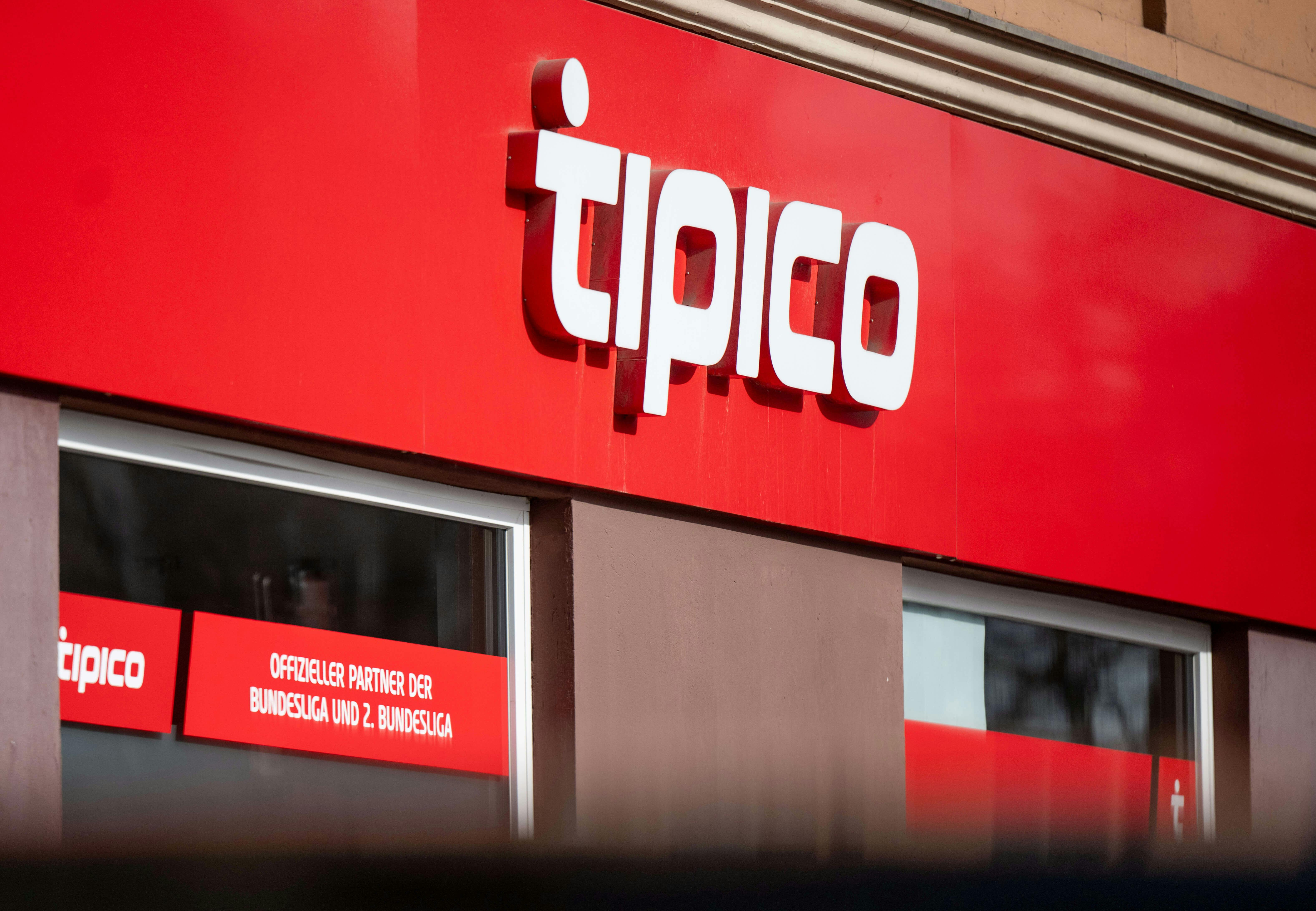 The logo of Tipico, a sports betting provider, is displayed above the entrance to a branch of the betting shop.