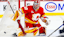 Calgary Flames goaltender Dustin Wolf (32) makes a save against the Seattle Kraken during the first period at Scotiabank Saddledome.