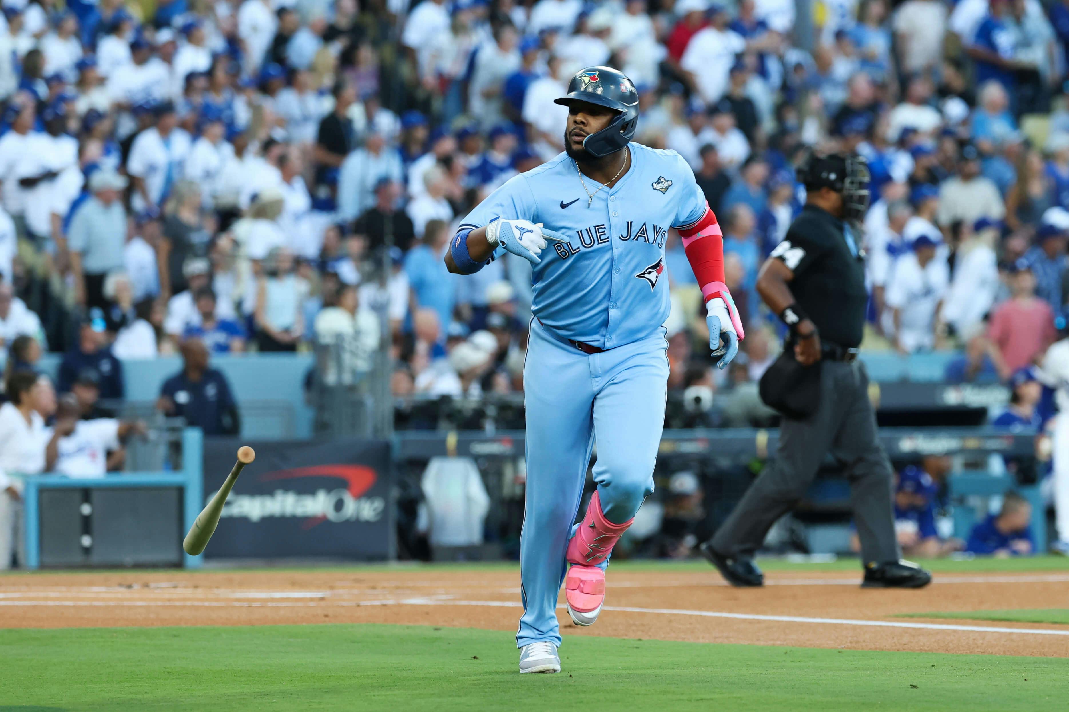 Toronto Blue Jays first baseman Vladimir Guerrero Jr. (27) celebrates after hitting a home run during the first inning against the Los Angeles Dodgers in Game 5 of the 2025 MLB World Series at Dodger Stadium. Kiyoshi Mio-Imagn Images
