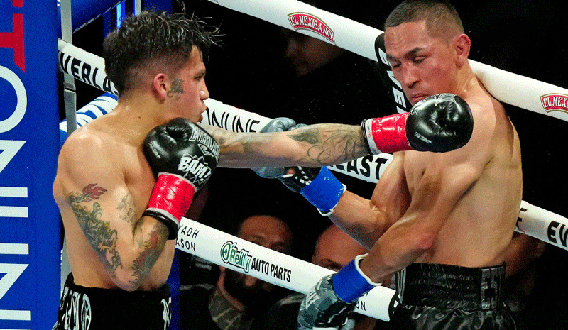 Jesse ‘Bam’ Rodriguez hits Juan Francisco Estrada along the ropes.