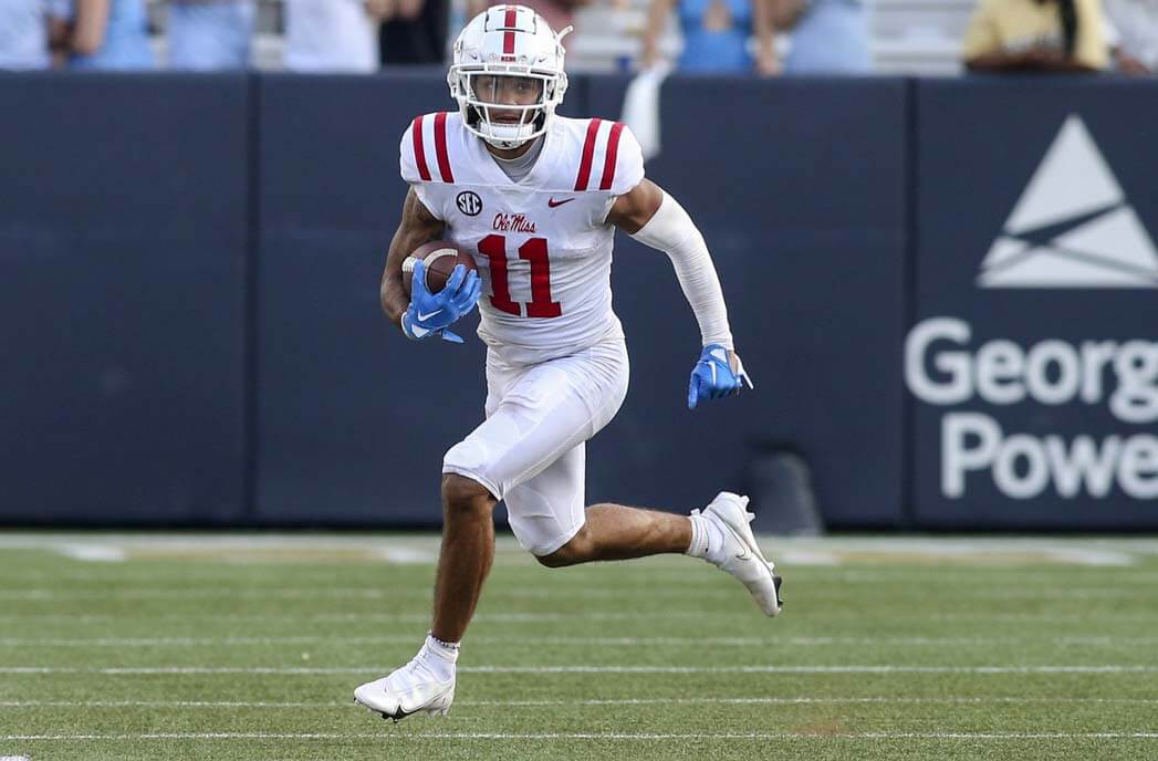 Mississippi Rebels wide receiver Jordan Watkins (11) runs with the ball against the Georgia Tech Yellow Jackets in the second half at Bobby Dodd Stadium.