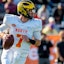 North quarterback Shea Patterson of Michigan (7) rolls out during the 2020 Senior Bowl college football game at Ladd-Peebles Stadium.
