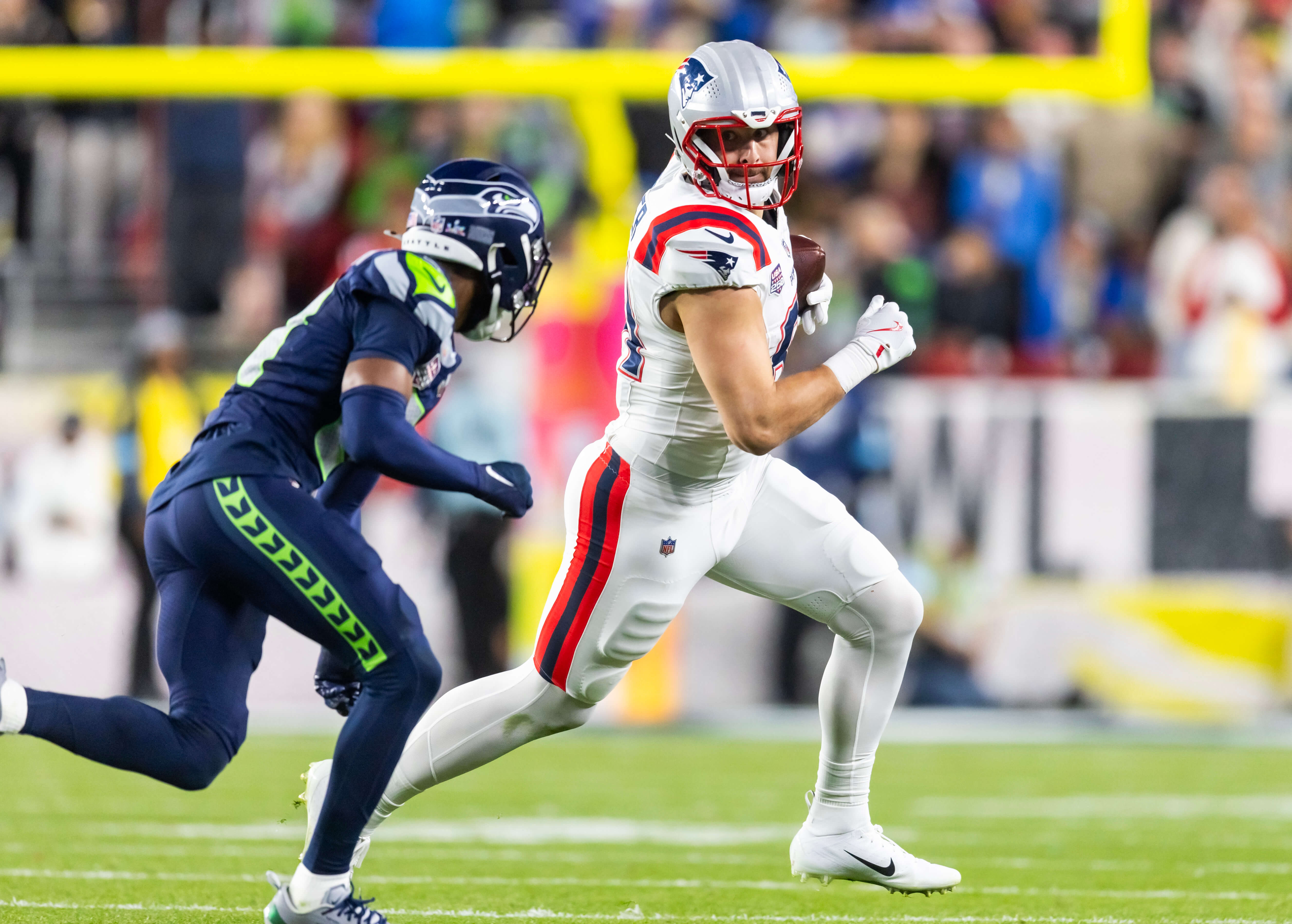 Patriots vs Seahawks AI predictions Week 1, New England Patriots tight end Hunter Henry (85) against the Seattle Seahawks during Super Bowl LX. Photo by Mark J. Rebilas-Imagn Images