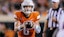 Oklahoma State Cowboys quarterback Zane Flores (6) behind the line.