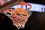 A detailed view of an official game ball with the NCAA logo. Mandatory Credit: Maria Lysaker-Imagn Images