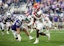 Rutgers Scarlet Knights running back Antwan Raymond (21) against the Kansas State Wildcats during the first half of the Rate Bowl at Chase Field. Mark J. Rebilas-Imagn Images