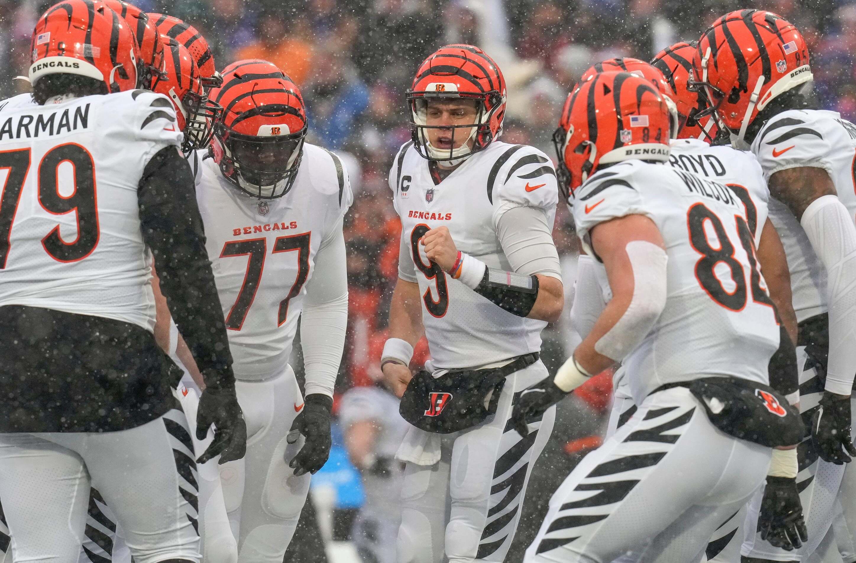 Cincinnati Bengals quarterback Joe Burrow (9) calls a play in the first quarter of the NFL divisional playoff football game between the Cincinnati Bengals and the Buffalo Bills, Sunday, Jan. 22, 2023, at Highmark Stadium in Orchard Park, N.Y.