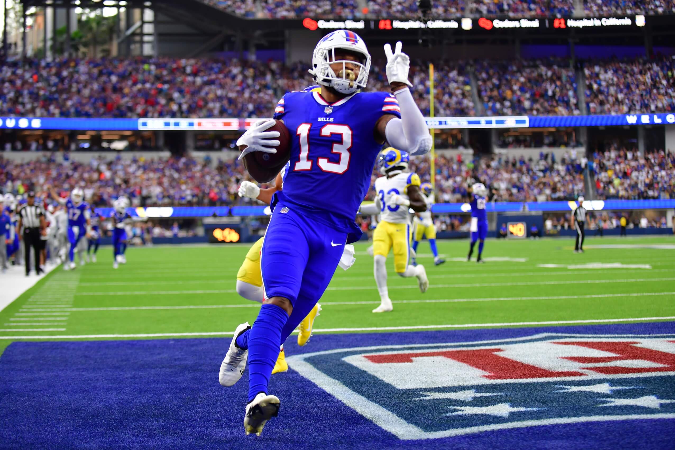 Sep 8, 2022; Inglewood, California, USA; Buffalo Bills wide receiver Gabe Davis (13) runs the ball in for a touchdown in the first quarter against the Los Angeles Rams at SoFi Stadium.