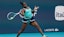 Coco Gauff (USA) hits a forehand against Magna Linette.