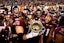 The Virginia Tech Hokies celebrates with the Commonwealth Cup after beating Virginia Cavaliers at Lane Stadium. Mandatory Credit: Peter Casey-Imagn Images