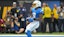 Los Angeles Chargers running back Omarion Hampton (8) runs for a touchdown.