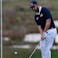 Team USA golfer Patrick Cantlay chips on the 18th hole.