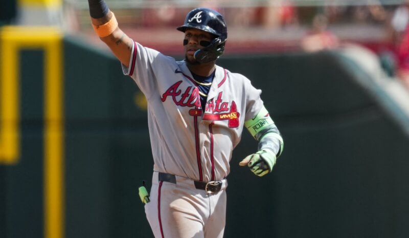 Ronald Acuna Jr. (13) gestures after hitting an RBI single.