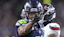 Seattle Seahawks wide receiver Jaxon Smith-Njigba (11) celebrates after a first down during the third quarter against the Houston Texans at Lumen Field.
