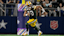 Green Bay Packers quarterback Jordan Love (10) runs with the ball.