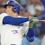 Toronto Blue Jays right fielder George Springer (4) hits a double against the Los Angeles Dodgers in the first inning during game two of the 2025 MLB World Series at Rogers Centre.