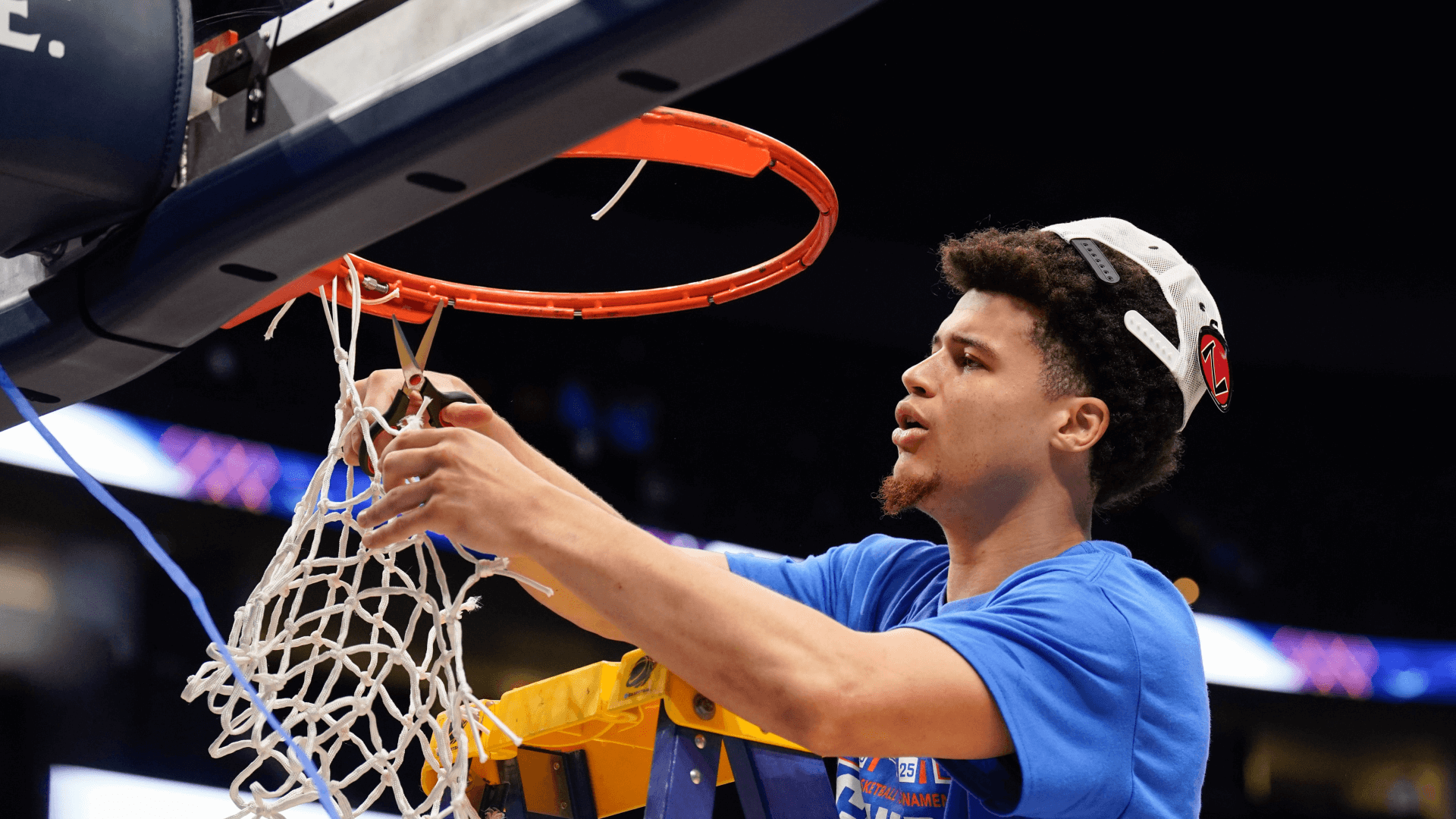 Florida guard Walter Clayton Jr. (1) cuts down his piece of the net as the team celebrates their win over Tennessee after the Southeastern Conference tournament championship.