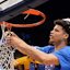 Florida guard Walter Clayton Jr. (1) cuts down his piece of the net as the team celebrates their win over Tennessee after the Southeastern Conference tournament championship.