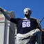 A statue at Caesars Palace Las Vegas wears a Las Vegas Raiders jersey.