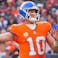 Denver Broncos quarterback Bo Nix (10) throws a pass against the Dallas Cowboys in the second half at Empower Field at Mile High.