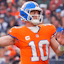 Denver Broncos quarterback Bo Nix (10) throws a pass against the Dallas Cowboys in the second half at Empower Field at Mile High.
