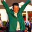 Hideki Matsuyama celebrates with the green jacket after winning The Masters golf tournament. -  USA TODAY Sports