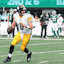 Pittsburgh Steelers quarterback Aaron Rodgers (8) prepares to throw the ball.