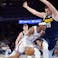 Oklahoma City Thunder guard Shai Gilgeous-Alexander (2) drives against Denver Nuggets center Nikola Jokic (15).