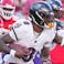Baltimore Ravens quarterback Lamar Jackson (8) scrambles during the third quarter against the Kansas City Chiefs at GEHA Field at Arrowhead Stadium.