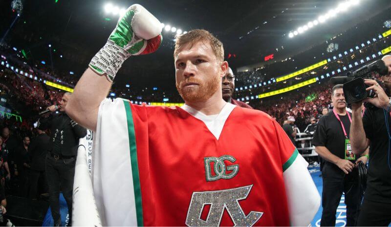 Canelo Alvarez (red trunks).