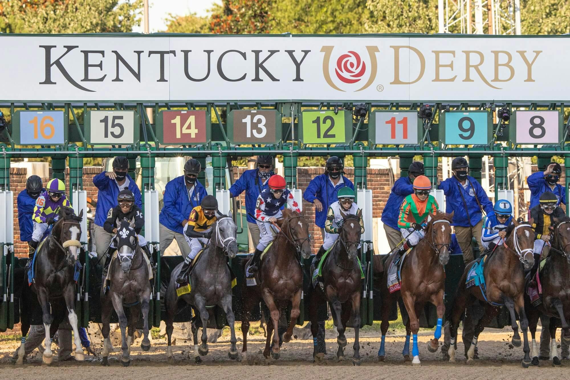 Competitors erupt from the starting gate during the running of the 146th Kentucky Derby. Authentic ridden by jockey John Velazquez would go on to win the race.