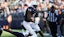 Penn State Nittany Lions running back Nicholas Singleton (10) avoids a tackle.