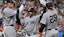 New York Yankees center fielder Trent Grisham (12) is congratulated.