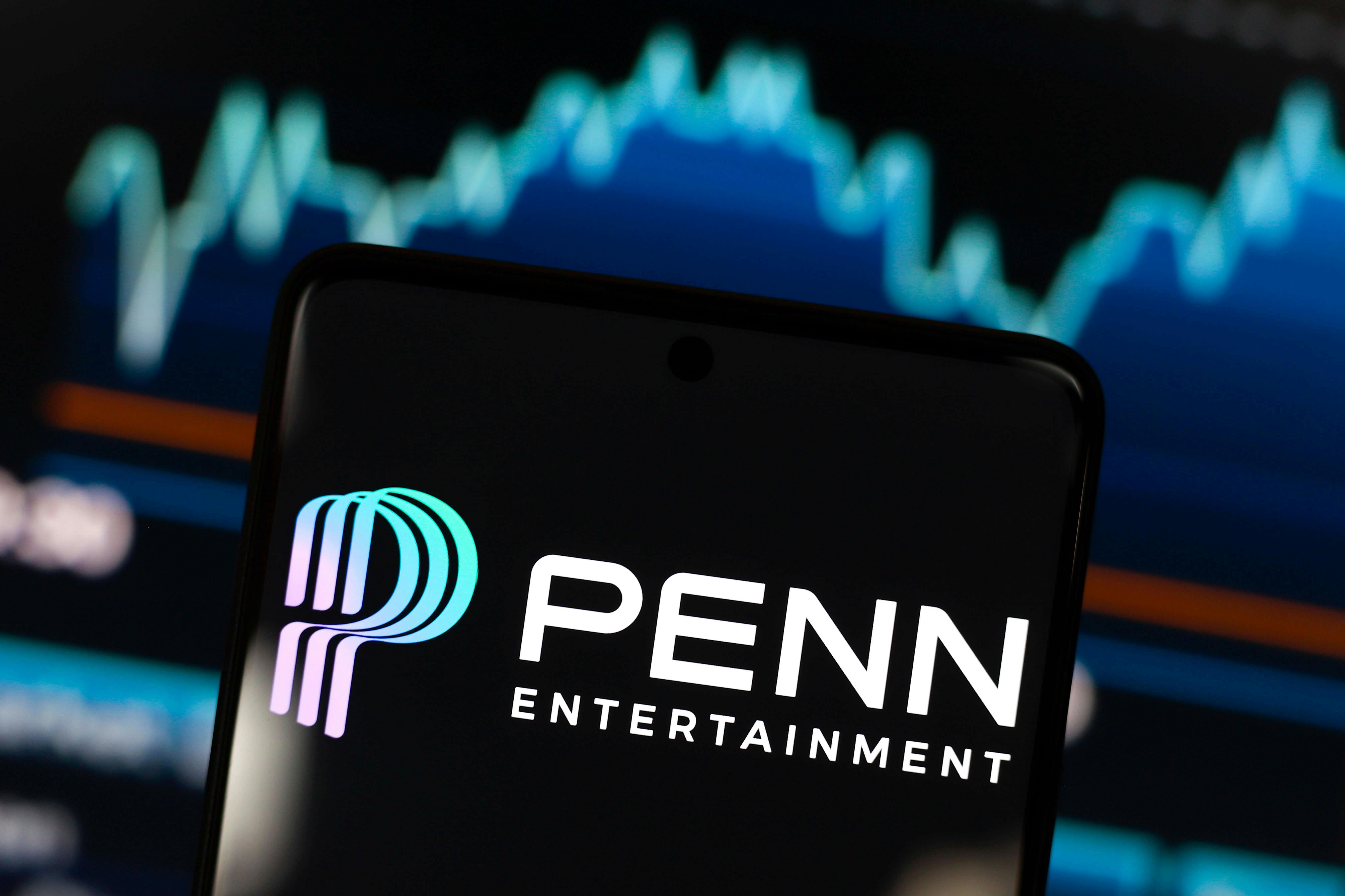 In this photo illustration, the Penn Entertainment, Inc. logo is displayed on a smartphone screen. (Photo by Jaque Silva / SOPA Images/Sipa USA) 