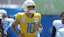 Los Angeles Chargers quarterback Justin Herbert (10) reacts during training camp.