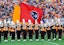 Tennessee Volunteers take the field behind the Tennessee state flag as the band plays before a game against the Vanderbilt Commodores at Neyland Stadium. Mandatory Credit: Bryan Lynn-Imagn Images