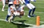 Cleveland Browns running back John Kelly (49) scores a touchdown in front of the defense of New York Giants cornerback Rodarius Williams (25) during the second half at FirstEnergy Stadium.