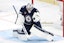 Winnipeg Jets goaltender Connor Hellebuyck (37) makes a glove save against the Dallas Stars in the third period in game two of the second round of the 2025 Stanley Cup Playoffs at Canada Life Centre. James Carey Lauder-Imagn Images