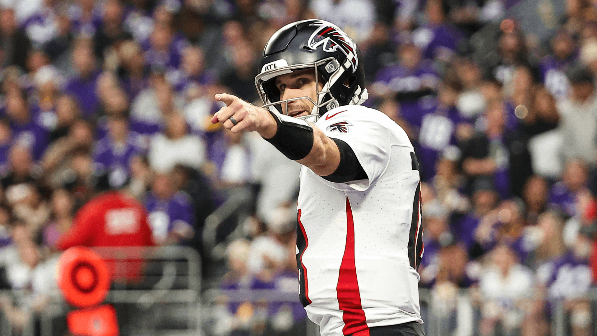 Atlanta Falcons quarterback Kirk Cousins (18) celebrates running back Bijan Robinson's (7) touchdown against the Minnesota Vikings.