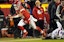 Kansas City Chiefs quarterback Patrick Mahomes (15) scrambles up the field against Buffalo Bills defensive end Boogie Basham (96) during the third quarter of the AFC Divisional playoff football game at GEHA Field at Arrowhead Stadium.