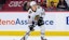 Chicago Blackhawks center Connor Bedard (98) controls the puck.