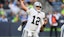 Las Vegas Raiders quarterback Aidan O'Connell (12) passes the ball.