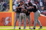 Cleveland Guardians players huddle after 3-1 win over Detroit Tigers at Comerica Park in Detroit on Thursday, Sept. 18, 2025.