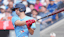 Toronto Blue Jays third baseman Ernie Clement (22) hits a single against the Baltimore Orioles during the eighth inning at Rogers Centre.
