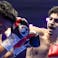 Nicaragua's Engel Gomez (L) and Saudi Arabia's Mohammed Alakel fight in their main card lightweight bout.