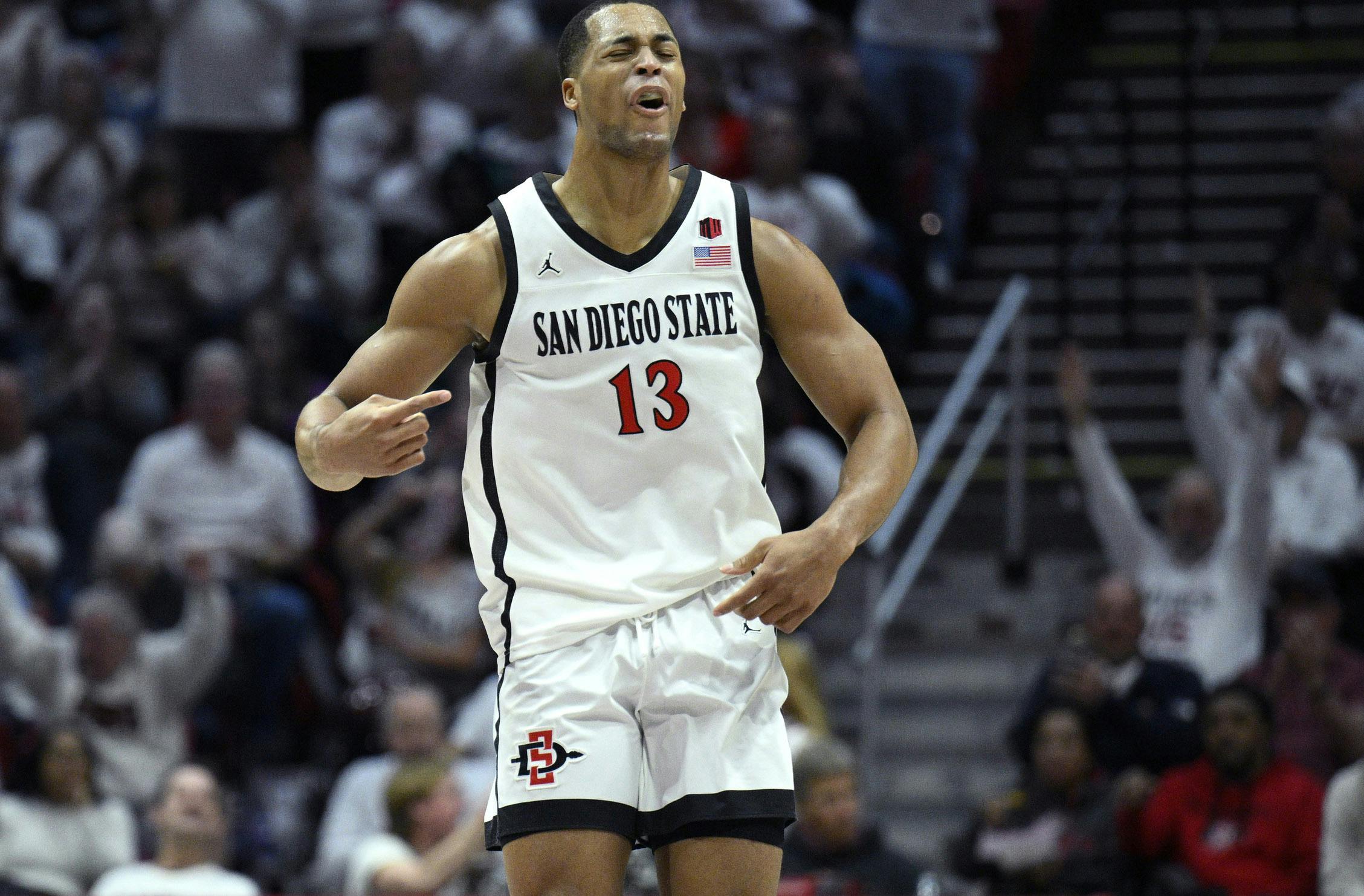 San Diego State Aztecs forward Jaedon LeDee (13) celebrates after a basket during the first half against the Boise State Broncos at Viejas Arena.