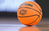 A March Madness basketball sits on the court during a timeout. Grace Hollars/IndyStar/USA TODAY NETWORK via Imagn Images