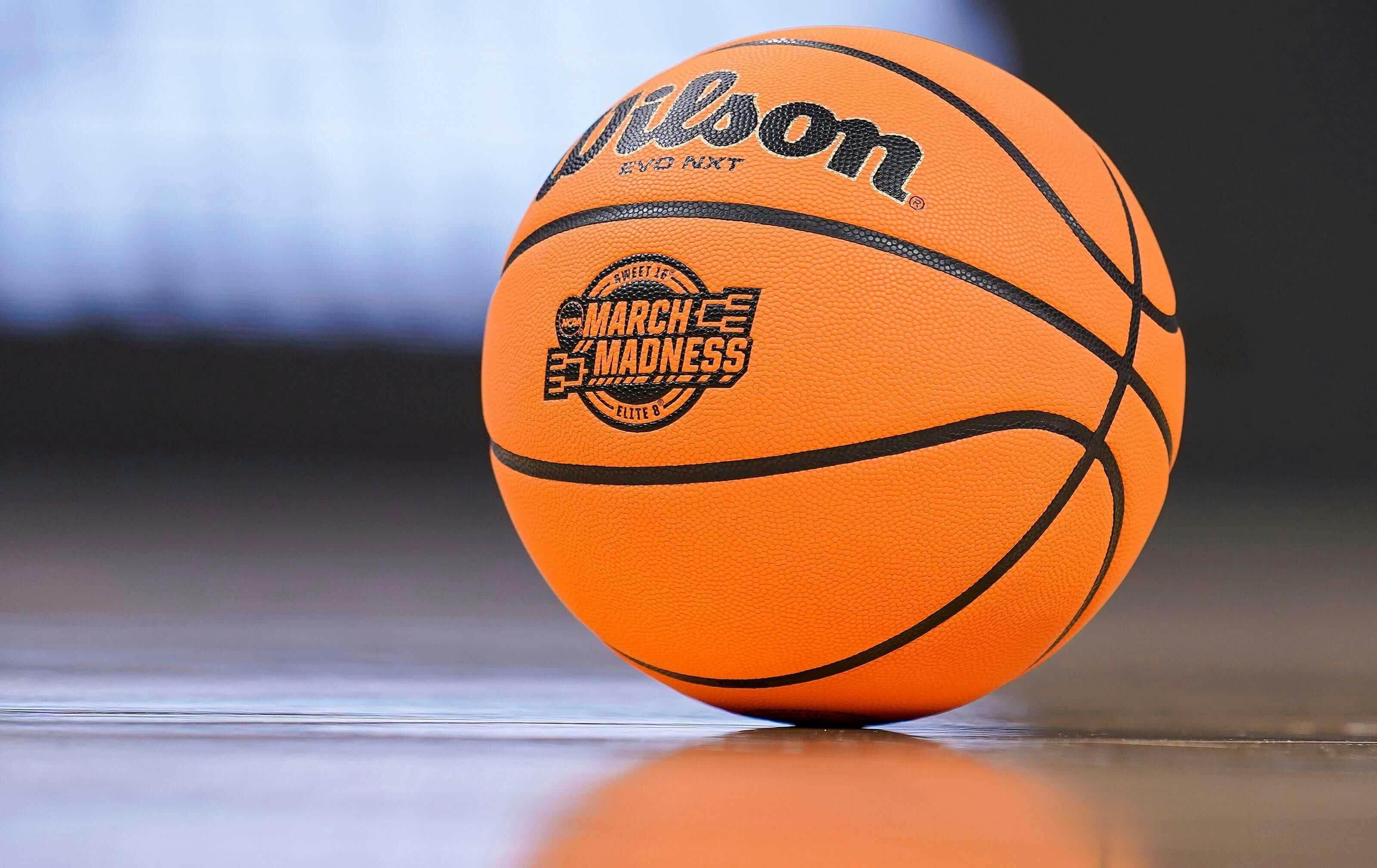 A March Madness basketball sits on the court during a timeout. Grace Hollars/IndyStar/USA TODAY NETWORK via Imagn Images