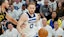 Minnesota Timberwolves guard Donte DiVincenzo (0) dribbles around Golden State Warriors guard Stephen Curry (30)